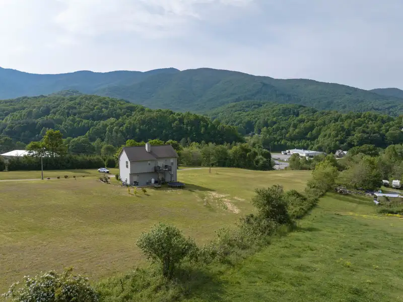 Historic 1918 Stone Building with 3.99 Acres and Detached Workshop in Balsam Road Area