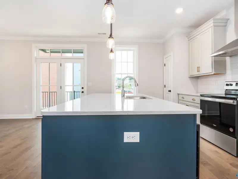 Live/work Townhome with Flex Space, Gourmet Kitchen, and 2-car Garage in Prime Location