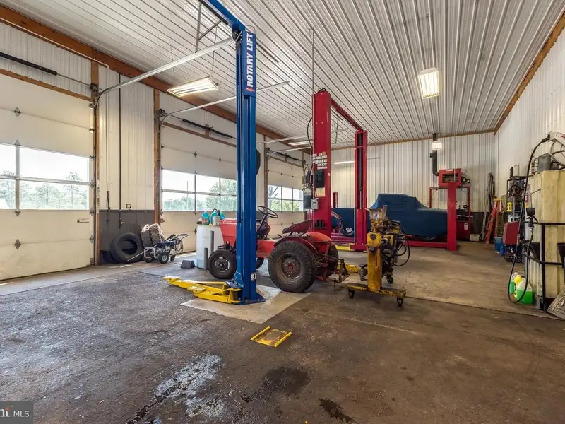 Auto Repair Shop with Residential Income Opportunity in Prime Location