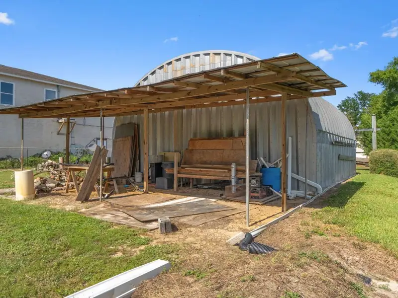 30x30 Enclosed Quonset Building with Pole Barn and Storage on Hwy 98