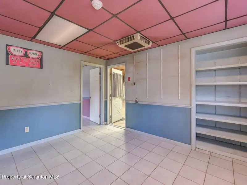 Mixed-use Property in Throop: 7-bay Garage and Updated 2-bedroom Apartment