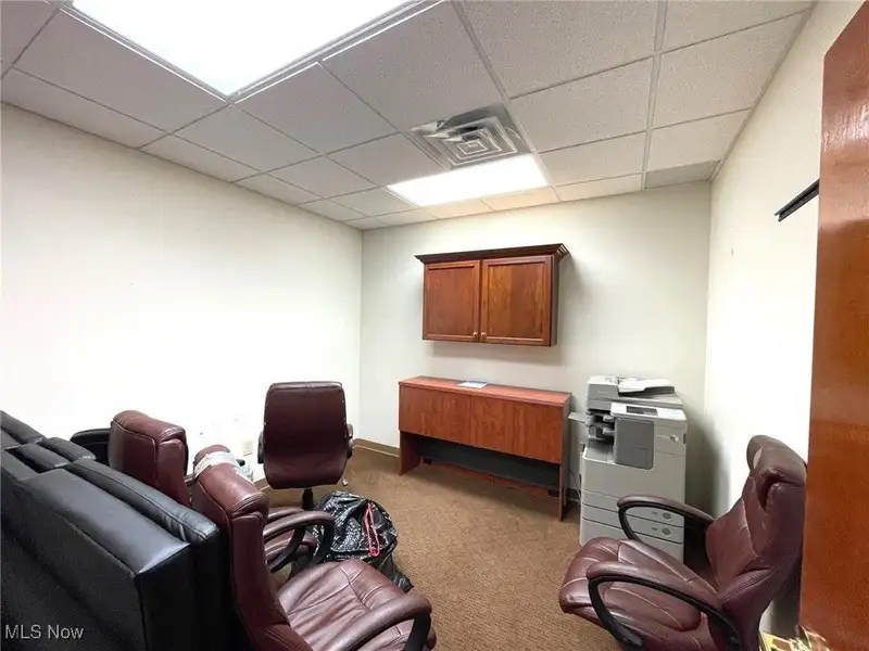 Well-maintained Two-story Brick Building with Retail and Workshop Space in Ne Location