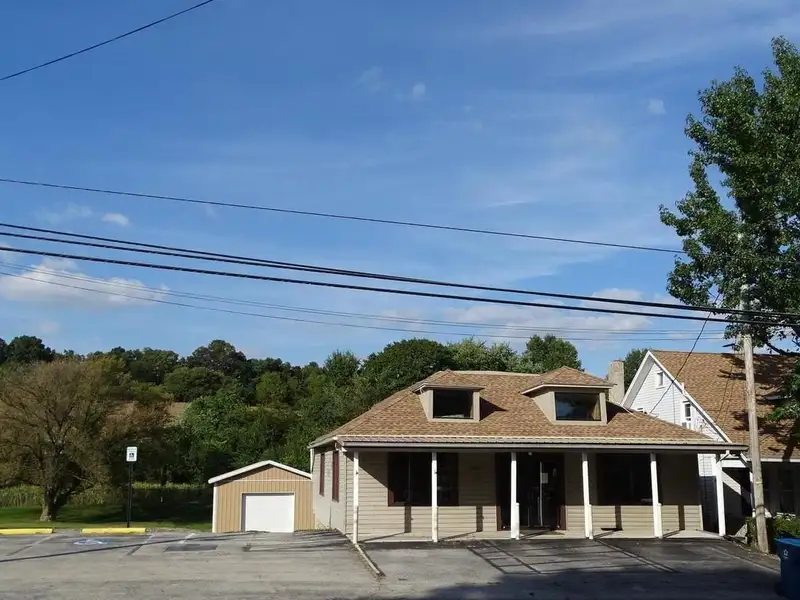 Mixed-use Commercial Property with Bakery and Catering Space in Prime Corner Location