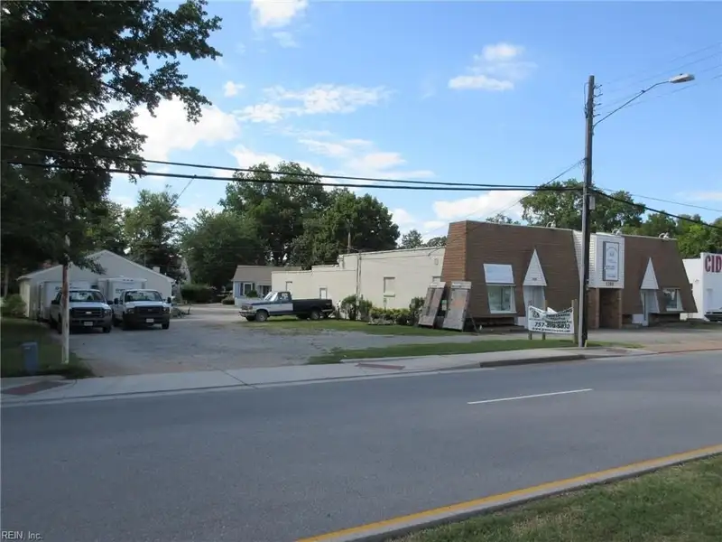 Turnkey Fully Leased Office Building with Garages in Prime Langley Afb Location