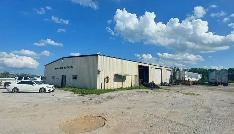 10.94 Acres with 7,500 Sq Ft Warehouse on High-visibility State Rd 46 Frontage