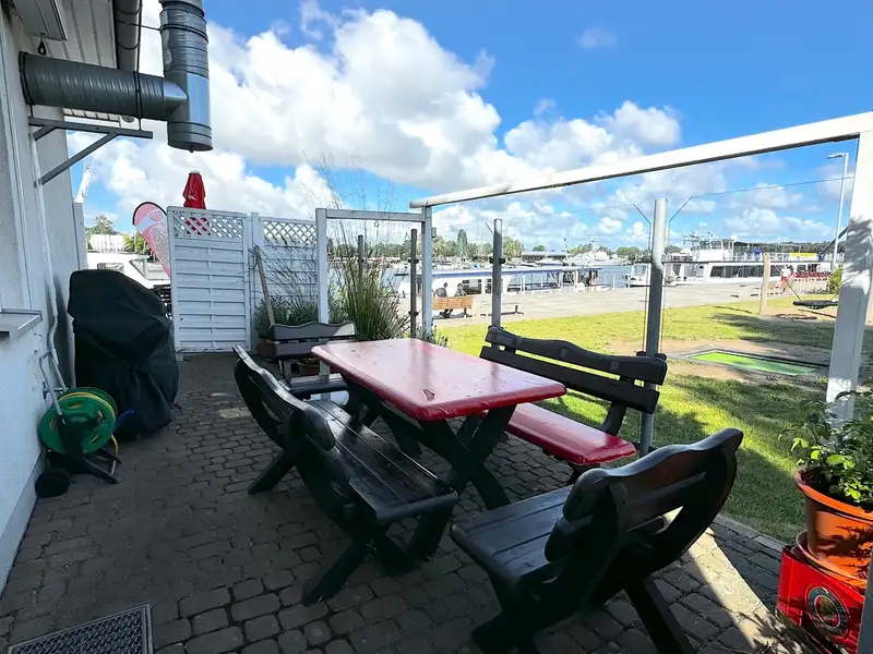 Mixed-use Property with Snack Bar and Apartment on Peenemünde Harbor Promenade