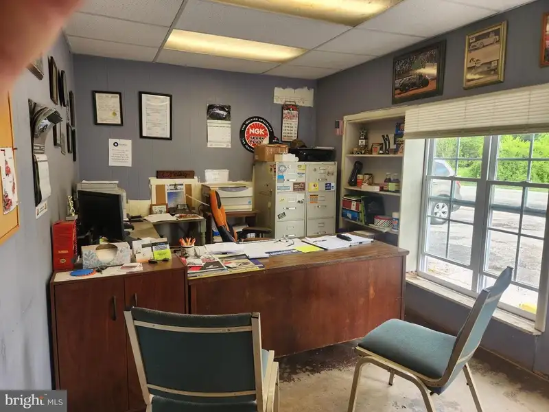 Versatile 9-acre Property with Salvage Yard, Auto Repair Shop, and Approved Car Sales Lot