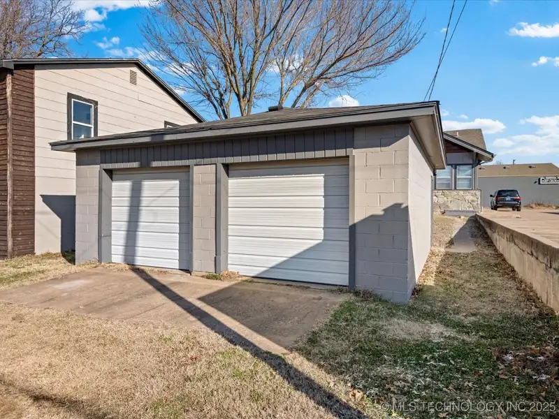 Commercial Bungalow in Downtown Bartlesville with Basement and Detached Garage