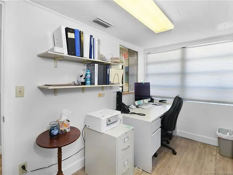 Versatile Office Building with Therapy Rooms and Break Area in R-3a Zoning