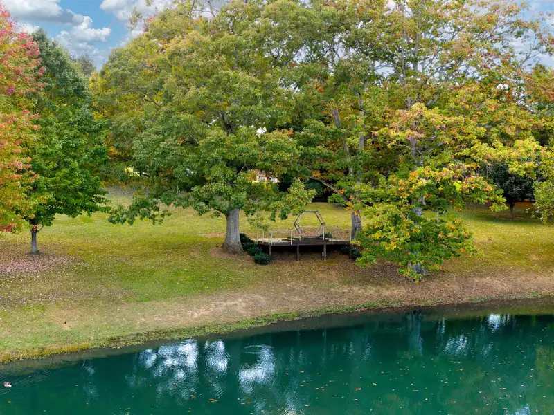 Multi-use Property on 16+ Acres with Home, Barndominium, Pond, and Pool in Western Nc