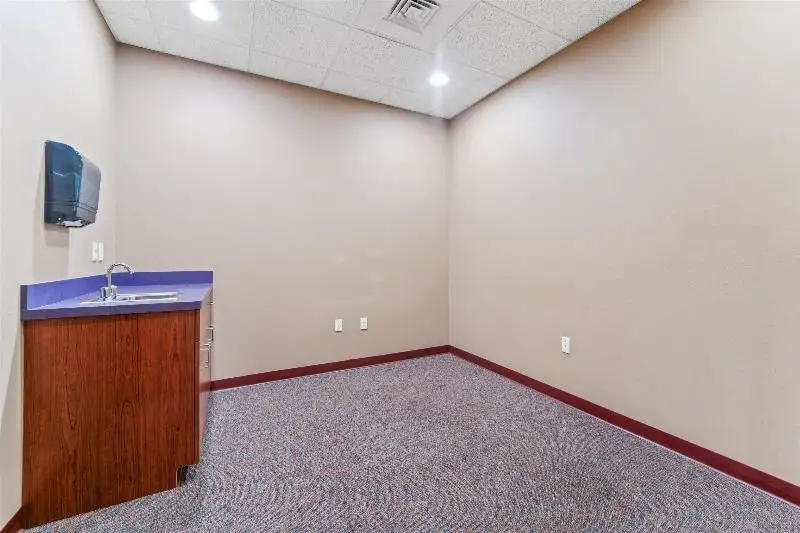 Versatile Commercial Condo for Sale Near Hwy 151 & 41 with Multiple Offices and Amenities