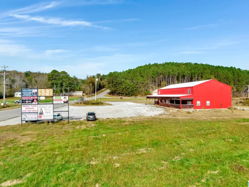 Prime Commercial Property Near Smith Lake with 3,800 Sq Ft Building and Billboard Income