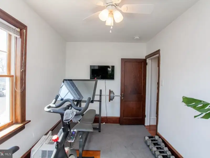 Multi-unit Building with Commercial Space and Two Residential Apartments in Established Location