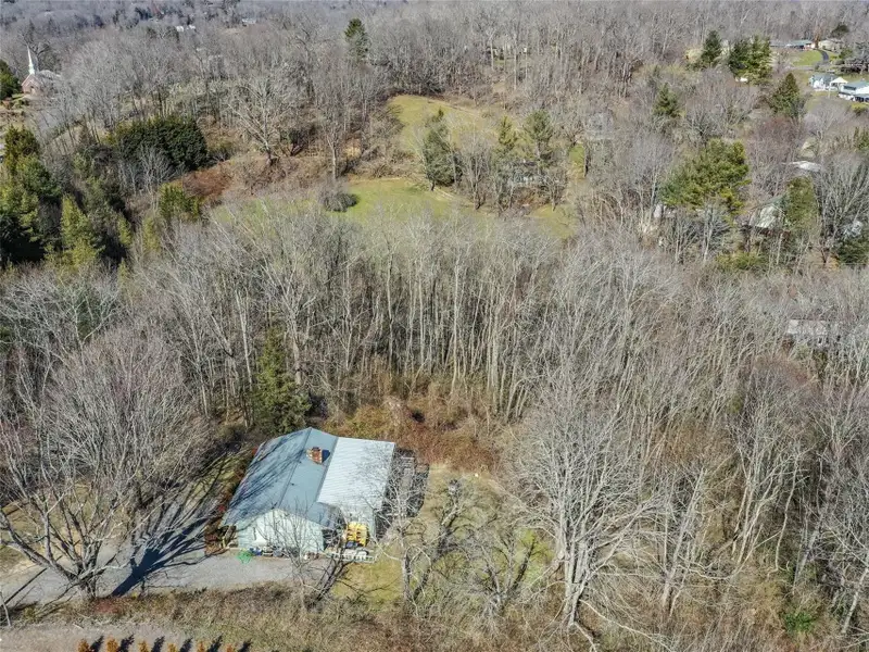 9.29 Acre Multi-family or Commercial Parcel in Waynesville Etj with City Utilities