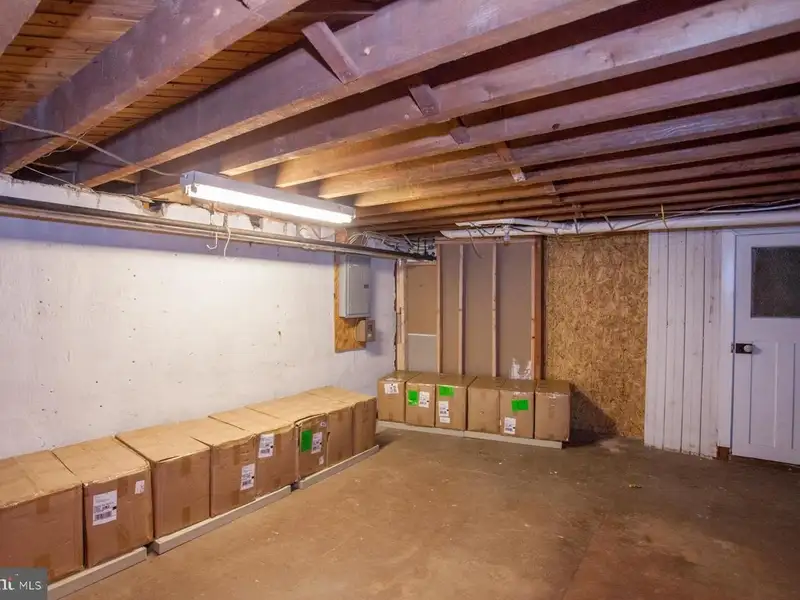 Multi-unit Building with Commercial Space and Two Residential Apartments in Established Location