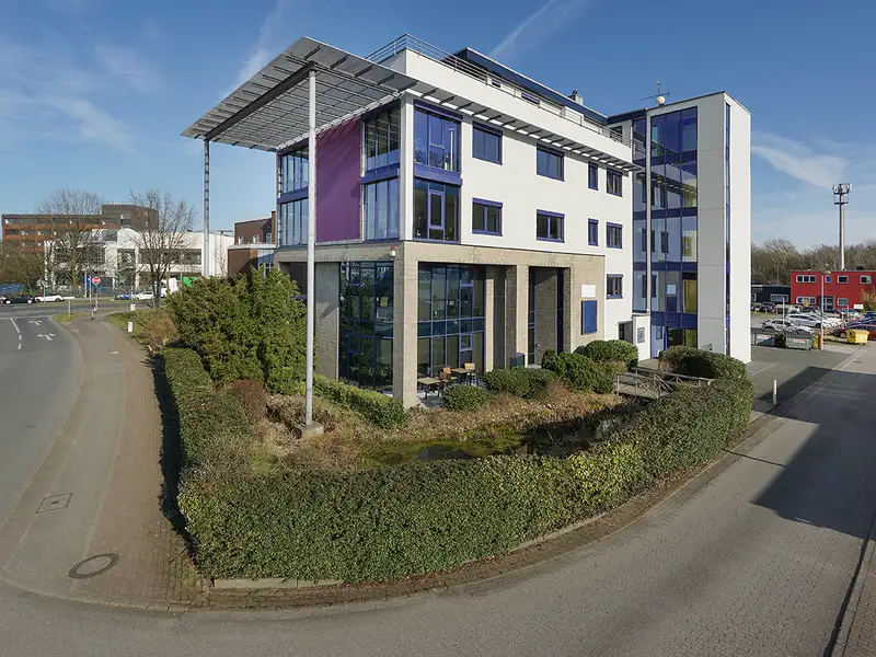 Modern Office Building with Renovated Spaces Near Centro Oberhausen, Includes Garden and Parking