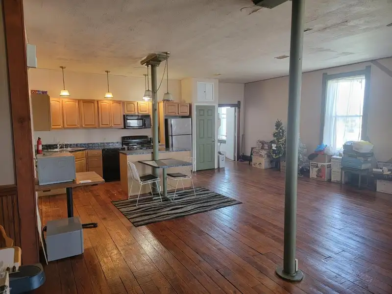 Investment Opportunity: Restaurant with Apartment and Additional Parking Near I-74
