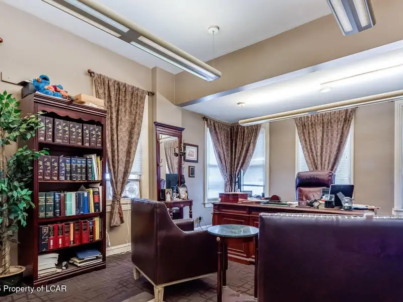 Versatile Office Building in Central Kingston with Multiple Offices and Ample Parking