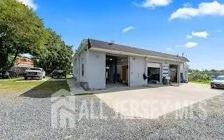 Turnkey Automotive Business with Car Dealership, Mechanic & Auto Body Shop in Prime Location