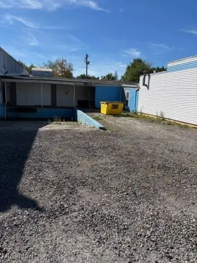 Multi-parcel Commercial Property with Storage and Rustic Office Space on 0.76 Acres