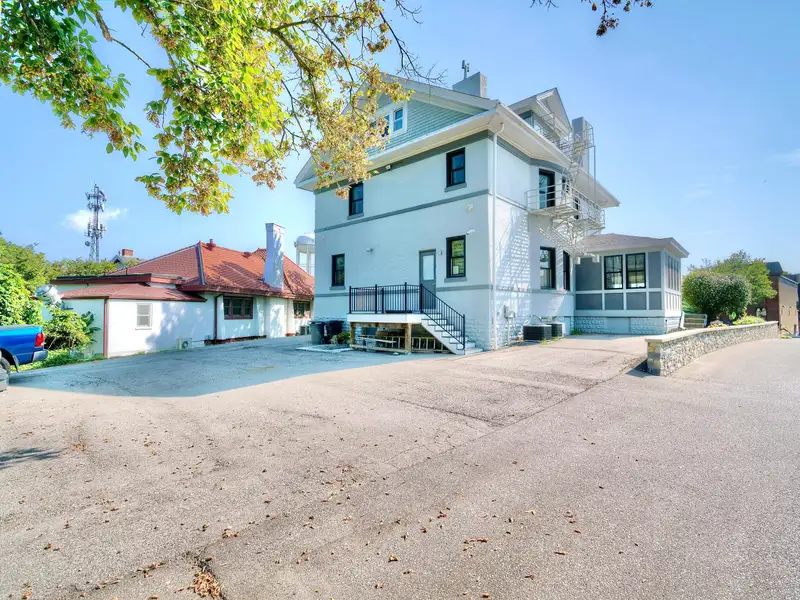 Renovated Commercial Building with Office Space and Parking in Historic Location