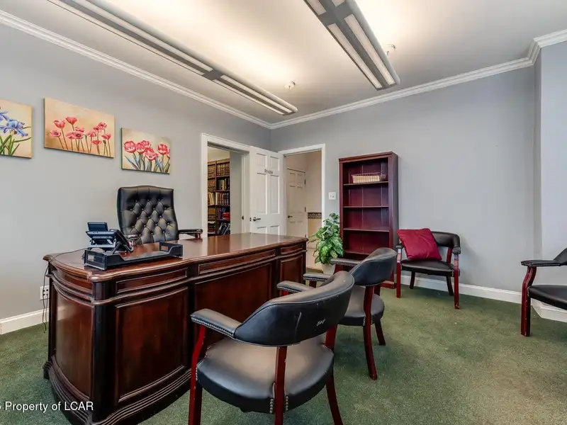 Versatile Office Building in Central Kingston with Multiple Offices and Ample Parking