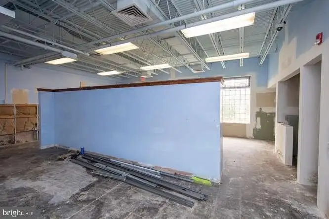 Versatile 6,000 Sq Ft Commercial Space in Prime Location with Parking Potential