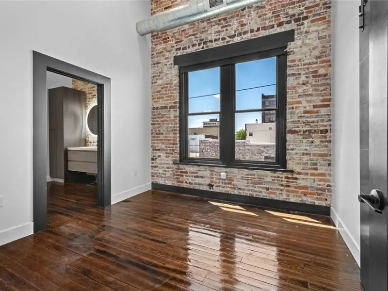 Mixed-use Commercial Property with Retail Space and Renovated Apartments in Downtown Joplin