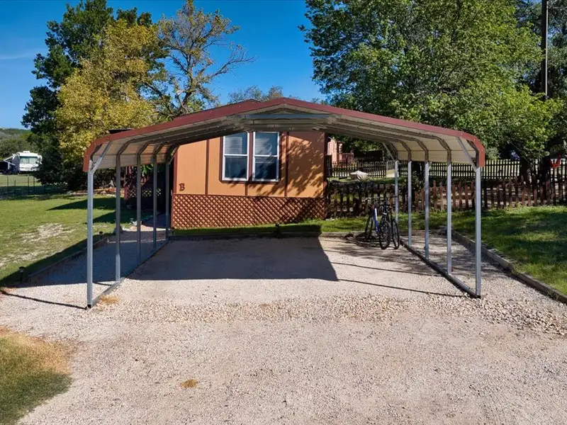 10-acre Mobile Home Community with 5 Units, Fenced, Workshop, and Growth Potential