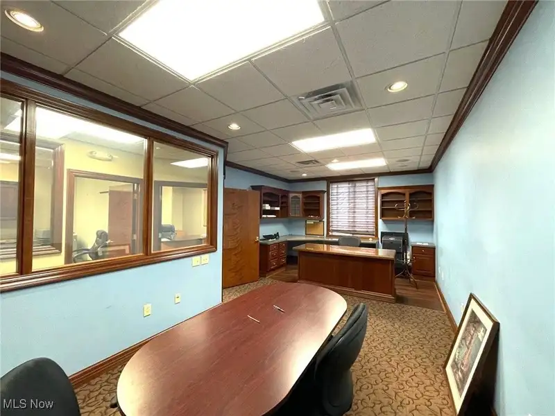 Well-maintained Two-story Brick Building with Retail and Workshop Space in Ne Location