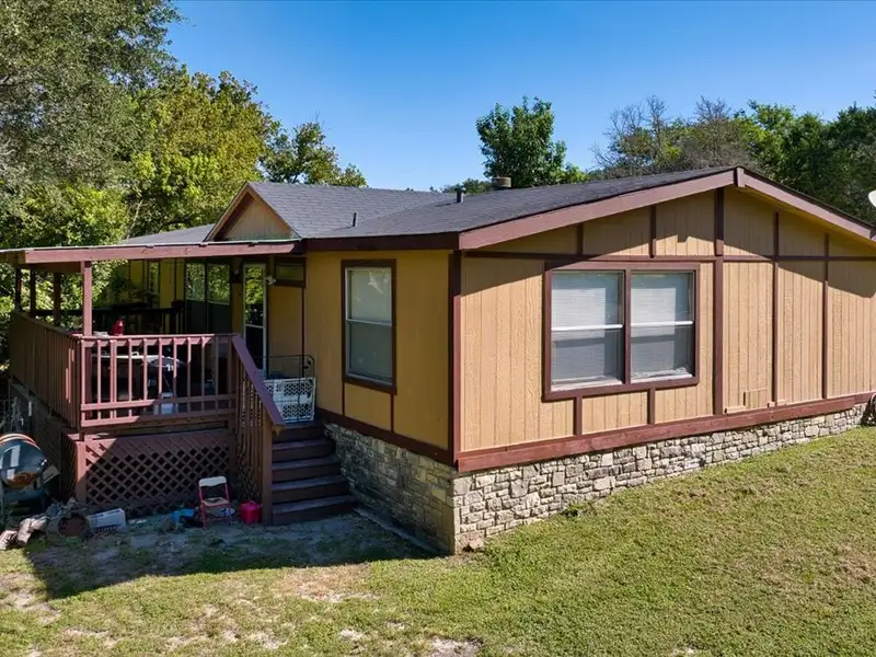 10-acre Mobile Home Community with 5 Units, Fenced, Workshop, and Growth Potential