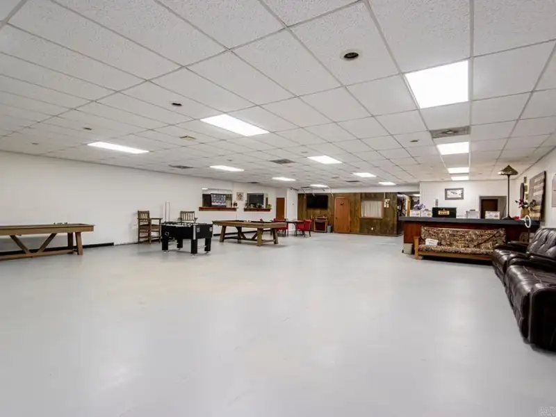 Office Space with Meeting Area, Kitchen, and Security Features in Convenient Location