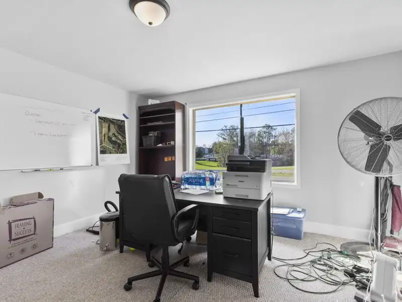 Versatile 4,305 Sq Ft Office Building with Apartment on Highway 11e