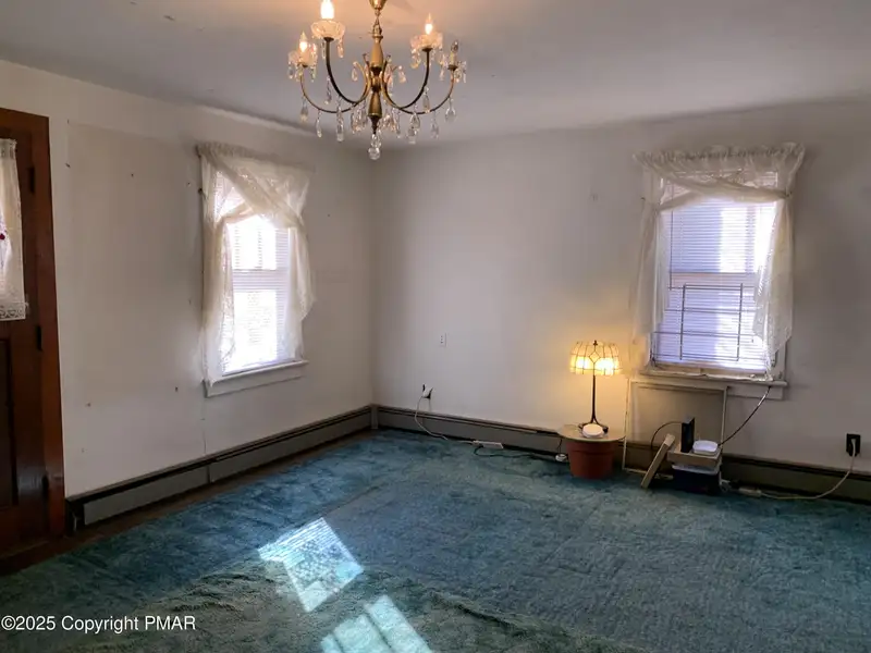 Prime 2-acre Commercial Property with 3-bedroom Home in High Traffic Area