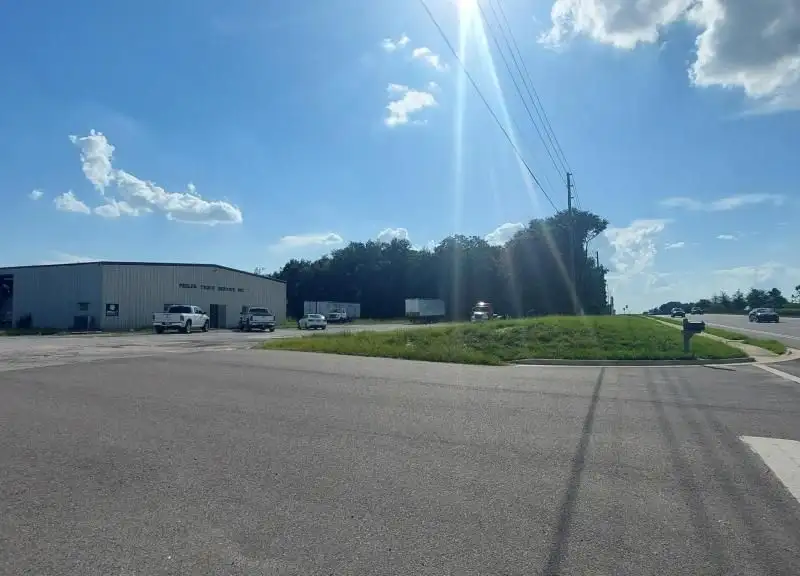 10.94-acre Commercial Property with 7,500 Sq Ft Warehouse on State Rd 46 Frontage