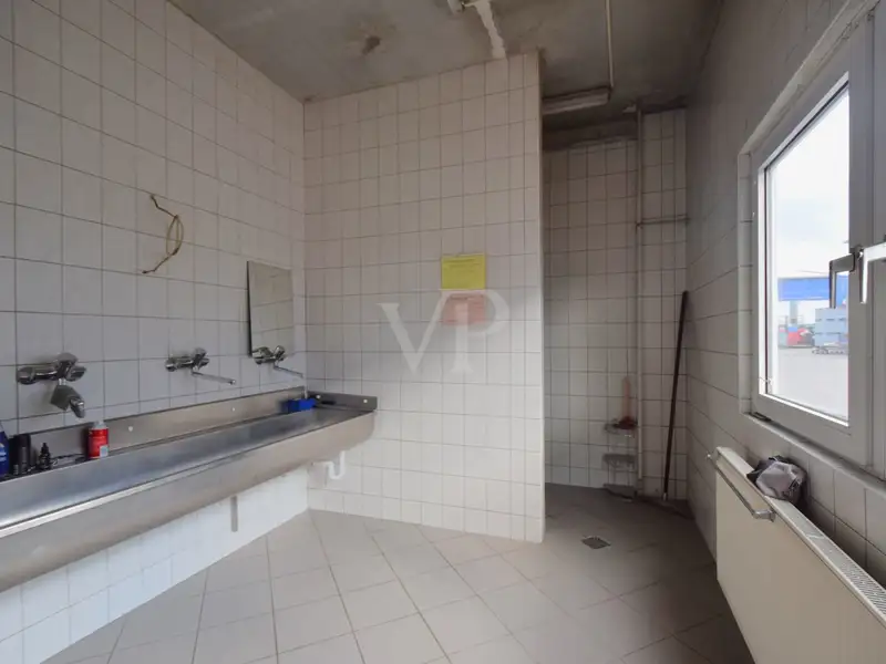 Versatile Industrial Property with Halls, Offices, and Open Space in Prime Location