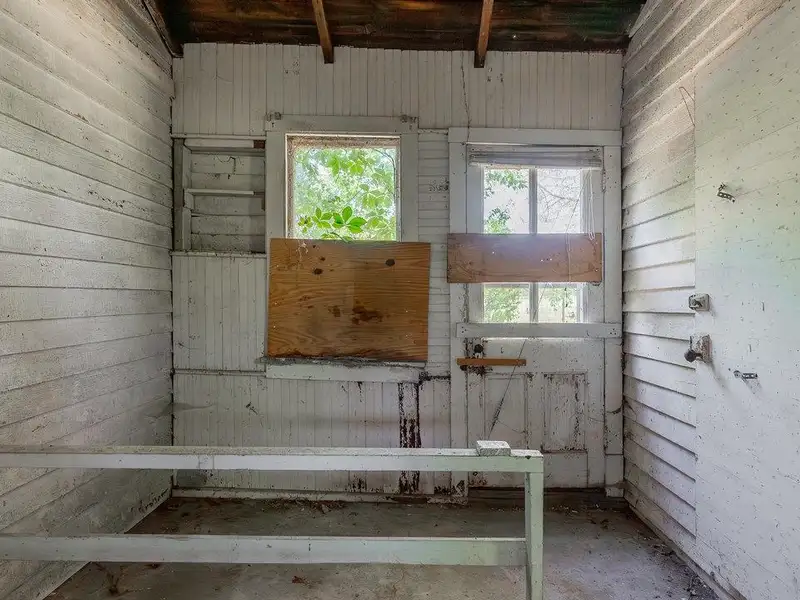 Classic American Foursquare Home in Need of Restoration with Detached Garage