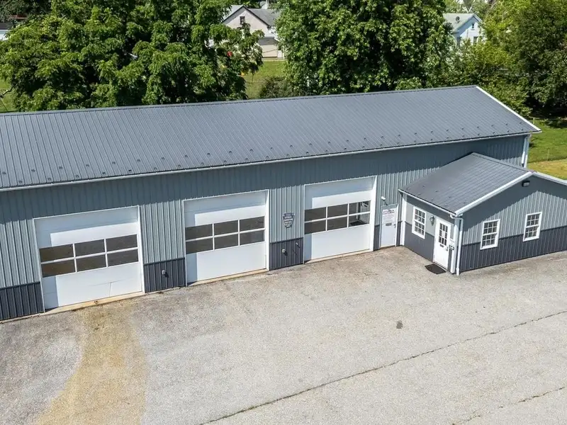 Auto Repair Shop with Residential Income Opportunity in Prime Location
