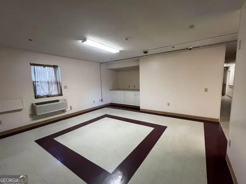 Two-level Commercial Unit with 26 Living/office Spaces in Re-zoned R4 Area