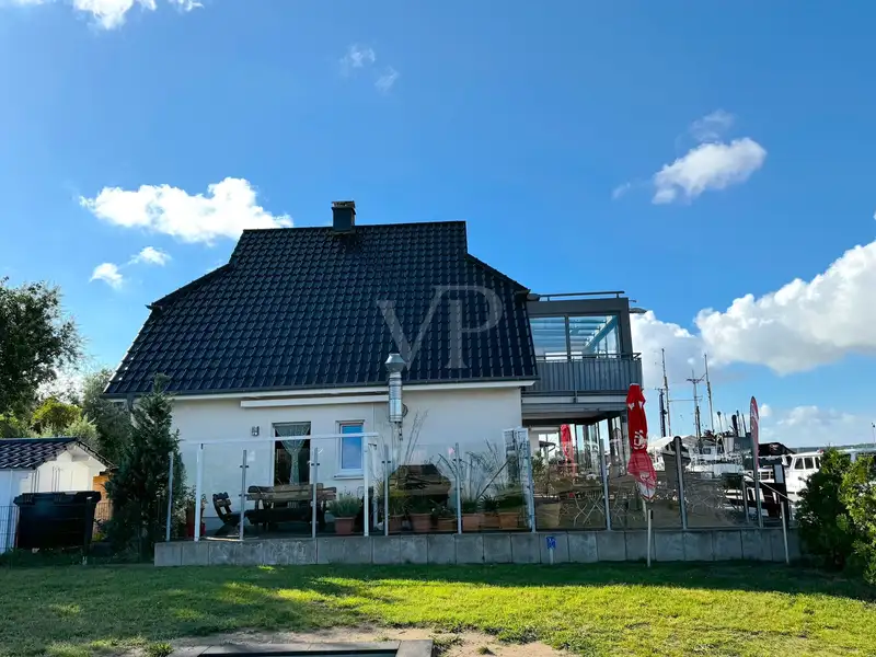 Mixed-use Property with Snack Bar and Apartment on Peenemünde Harbor Promenade