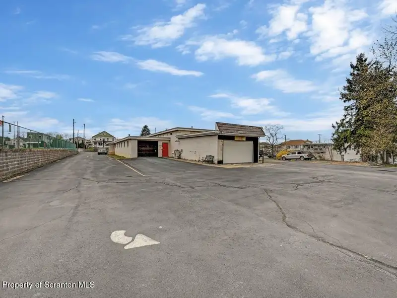 Mixed-use Building with Retail Space and Parking for Sale in Prime Location