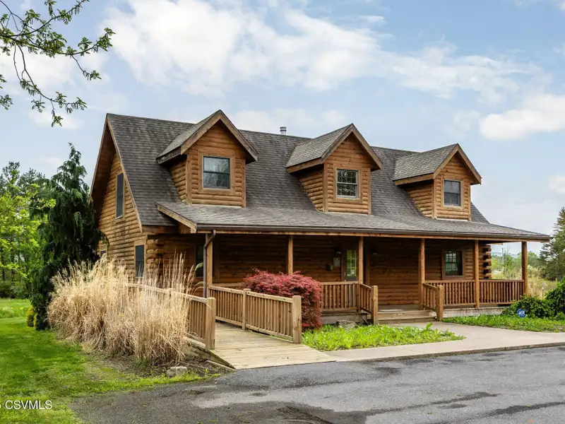 Commercial Log Home on 2 Acres with 3 Bedrooms and Scenic Views