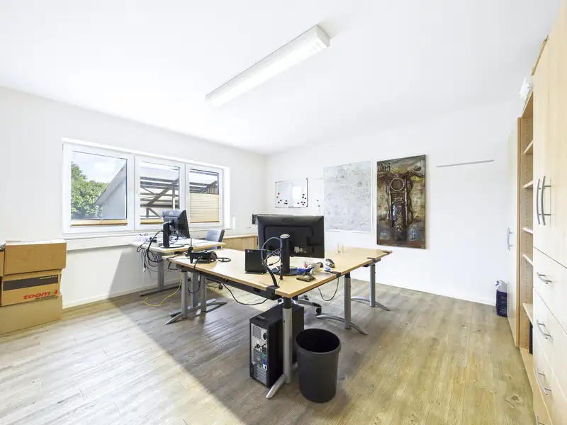 Modern Commercial Building with Exclusive Living Space in Aurich's Schirum Ii Industrial Estate