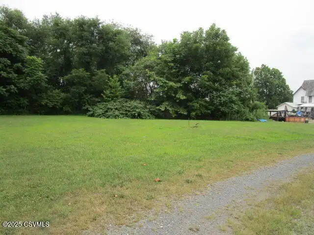 Partially Built Condo Development with Approved Plans in Picturesque Location
