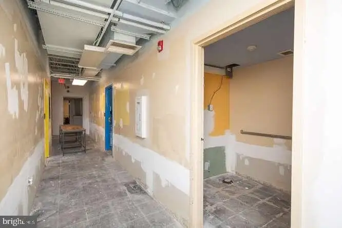 Versatile 6,000 Sq Ft Commercial Space in Prime Location with Parking Potential