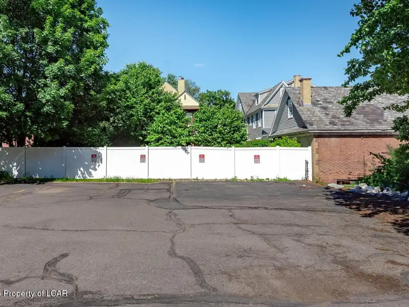 Versatile Office Building in Central Kingston with Multiple Offices and Ample Parking