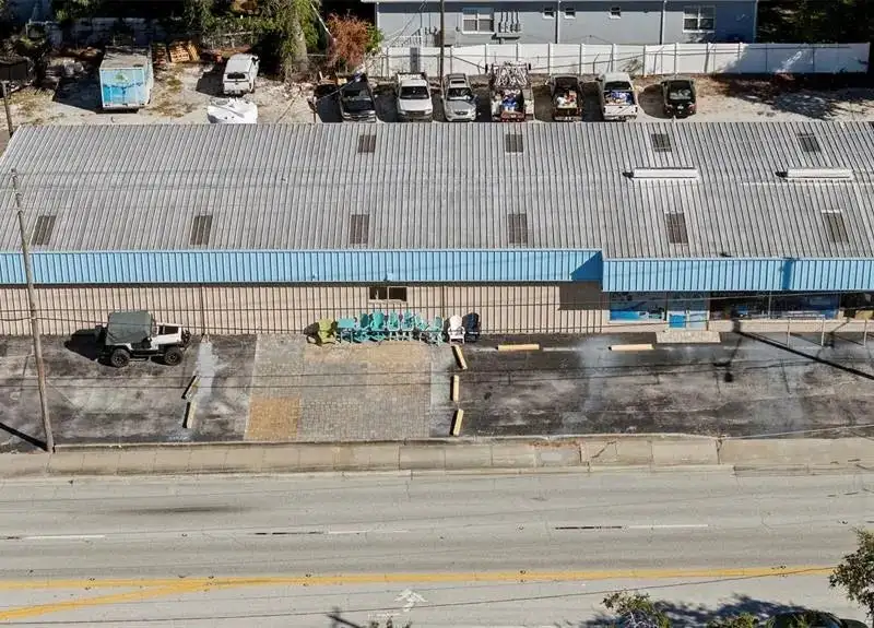 Retail Property on West Bay Drive with 7,250 Sf Building and Corner Lot