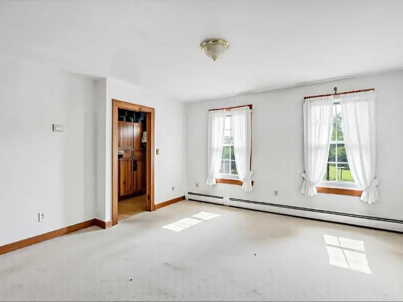 Commercial Retail/warehouse with Charming Colonial Home in High-traffic Corner Location