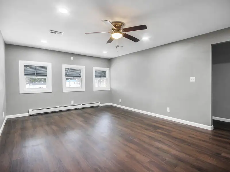 Mixed-use Two Unit Building with Remodeled Three Bedroom Apartment in Prime Location