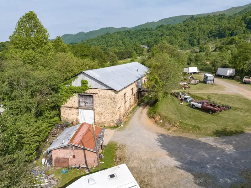 Historic 1918 Stone Building with 3.99 Acres and Detached Workshop in Balsam Road Area